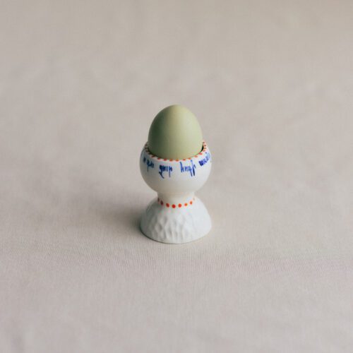 Egg cup with Armenian rhymes
